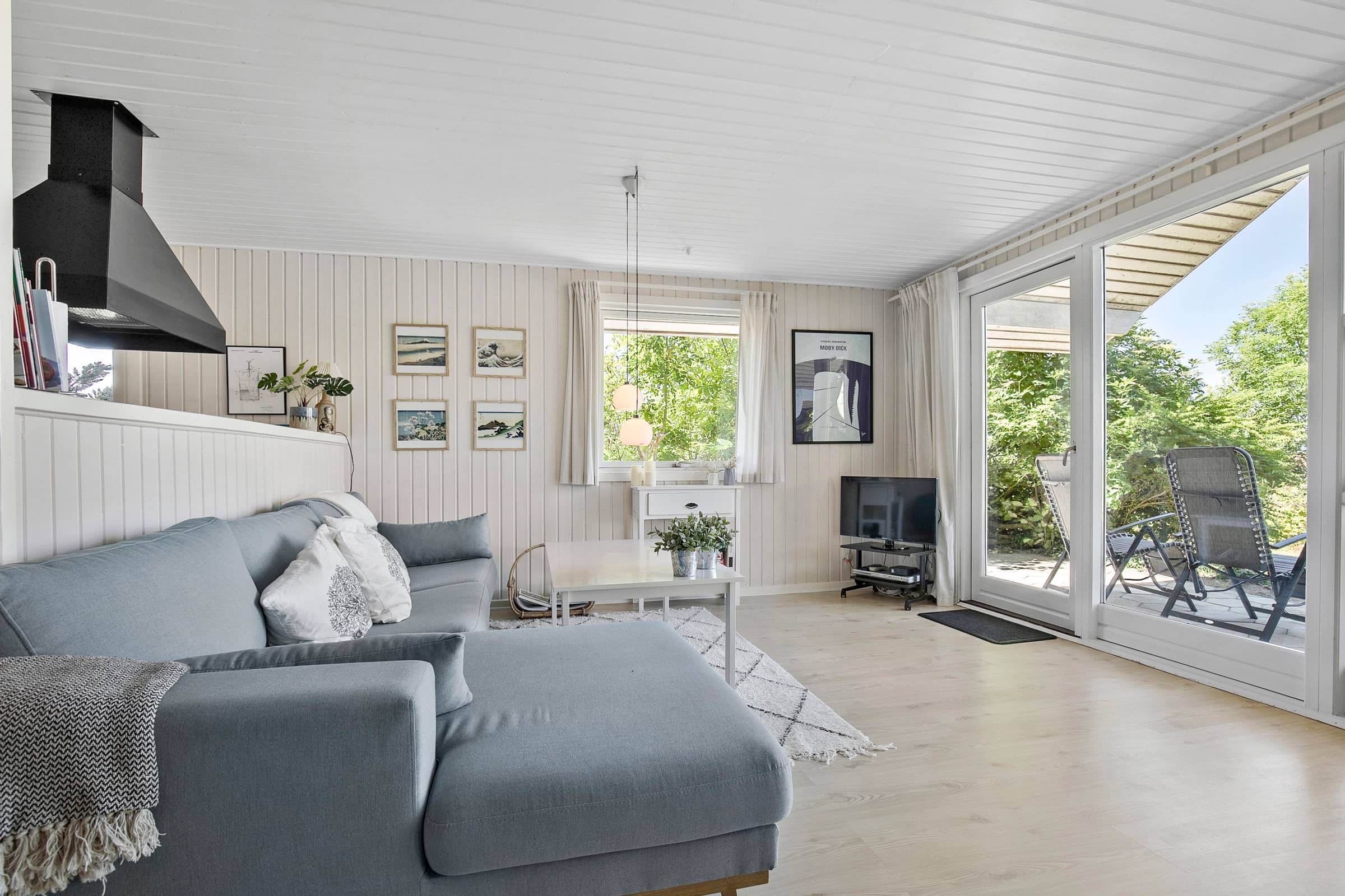 Lyst og hyggeligt sommerhus med havudsigt billede 5