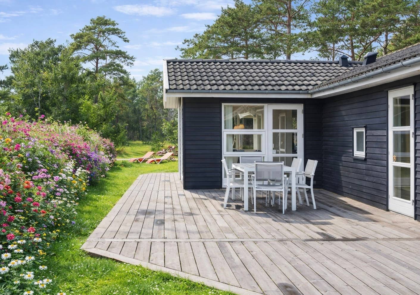 Lækkert sommerhus tæt på fantastisk badestrand billede 2