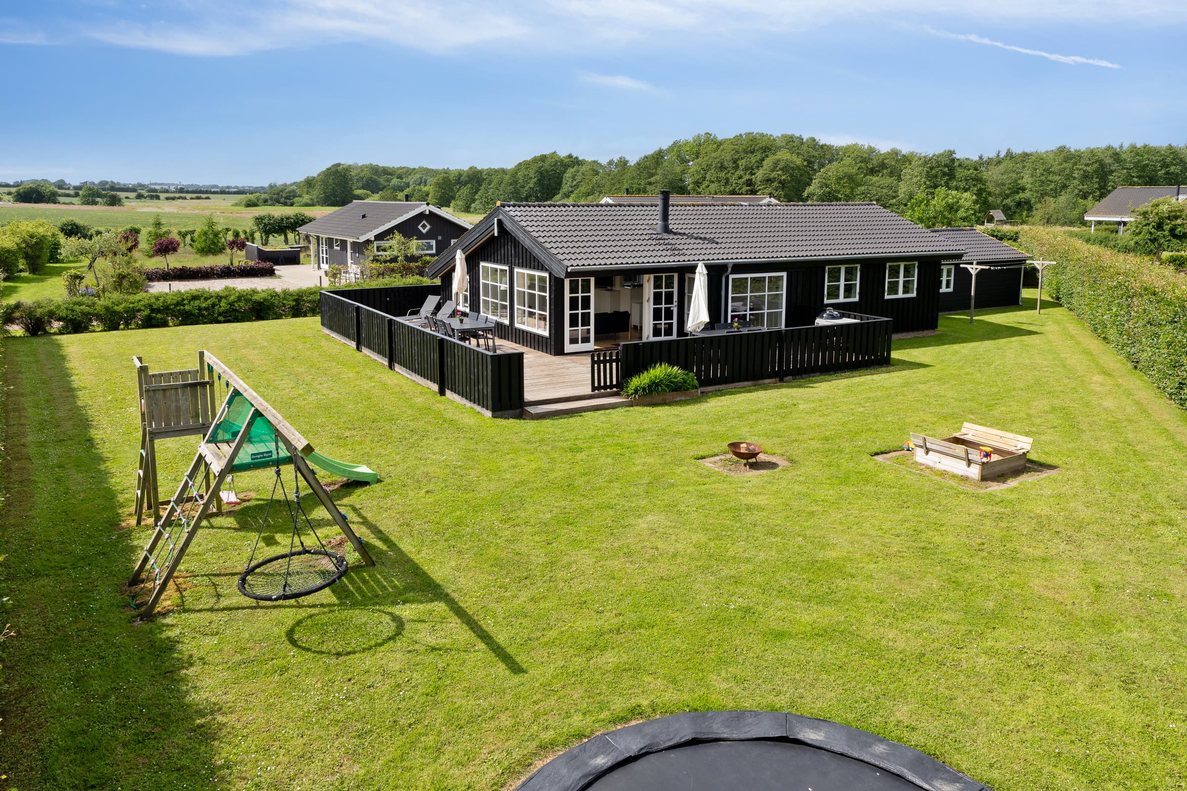 Flovt Strand – Fred og privat have - billede 1